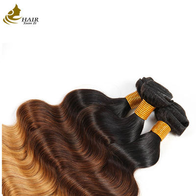 Precio de fábrica Ombre Extensiones de cabello humano 1b/4/27 Cabello virgen brasileño Body Wave Bundles con cierre