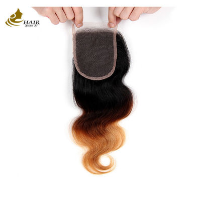 Precio de fábrica Ombre Extensiones de cabello humano 1b/4/27 Cabello virgen brasileño Body Wave Bundles con cierre