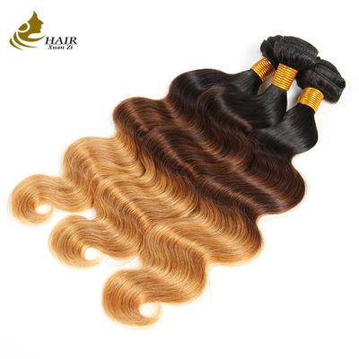 Precio de fábrica Ombre Extensiones de cabello humano 1b/4/27 Cabello virgen brasileño Body Wave Bundles con cierre