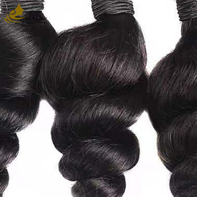 Olas sueltas de pelo humano brasileño natural extensiones de cabello negro