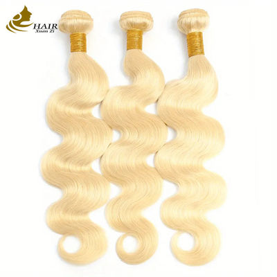 Venta al por mayor de cabello humano virgen vietnamita doble 613# color rubio cuerpo ondulado pelo paquete